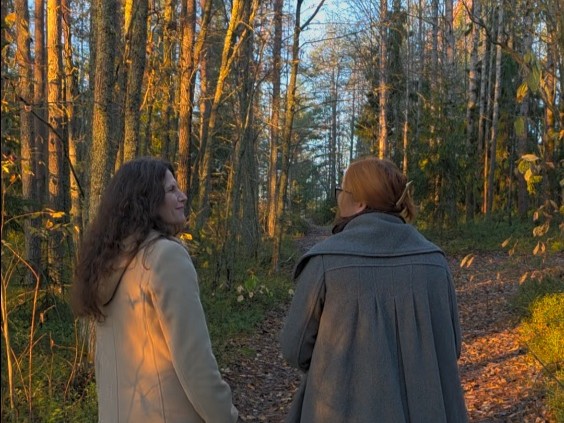 Coachande samtal under promenad